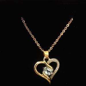 NIB14k gold plated over sterling silver heart with genuine blue topaz oval stone